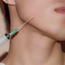 DHA-licensed practitioner administering Botox injection for forehead wrinkles at Yeppeun Skin Clinic Jumeirah 2 Dubai