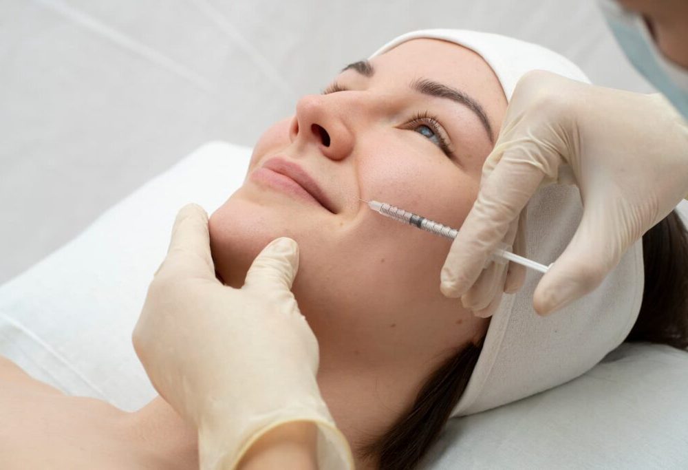 Licensed clinician performing PLLA Booster collagen-stimulating injectable treatment at Yeppeun Skin Clinic in Jumeirah 2, Dubai